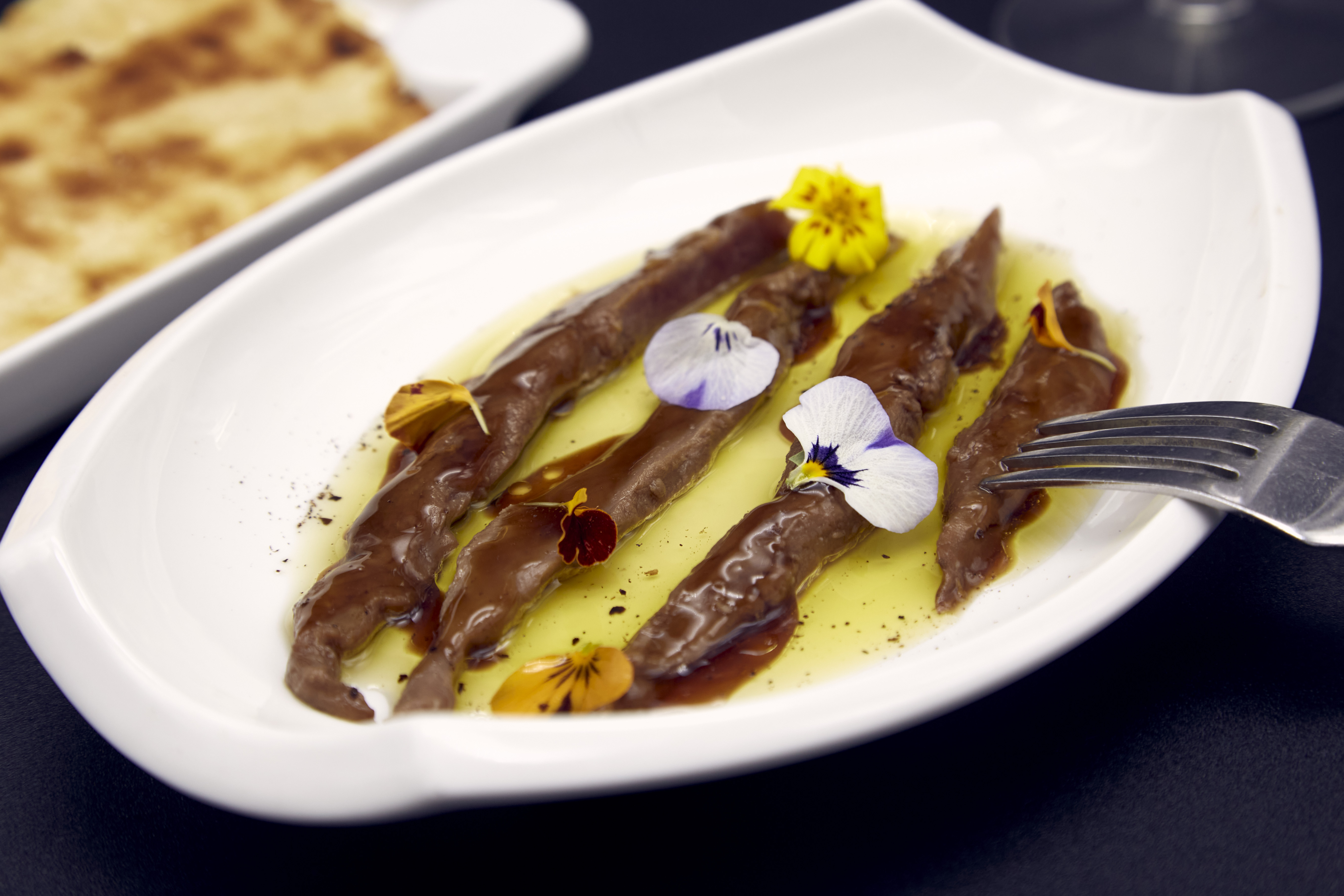 Mesa servida para grupo en Aflamas Restaurant, eventos privados en Barcelona